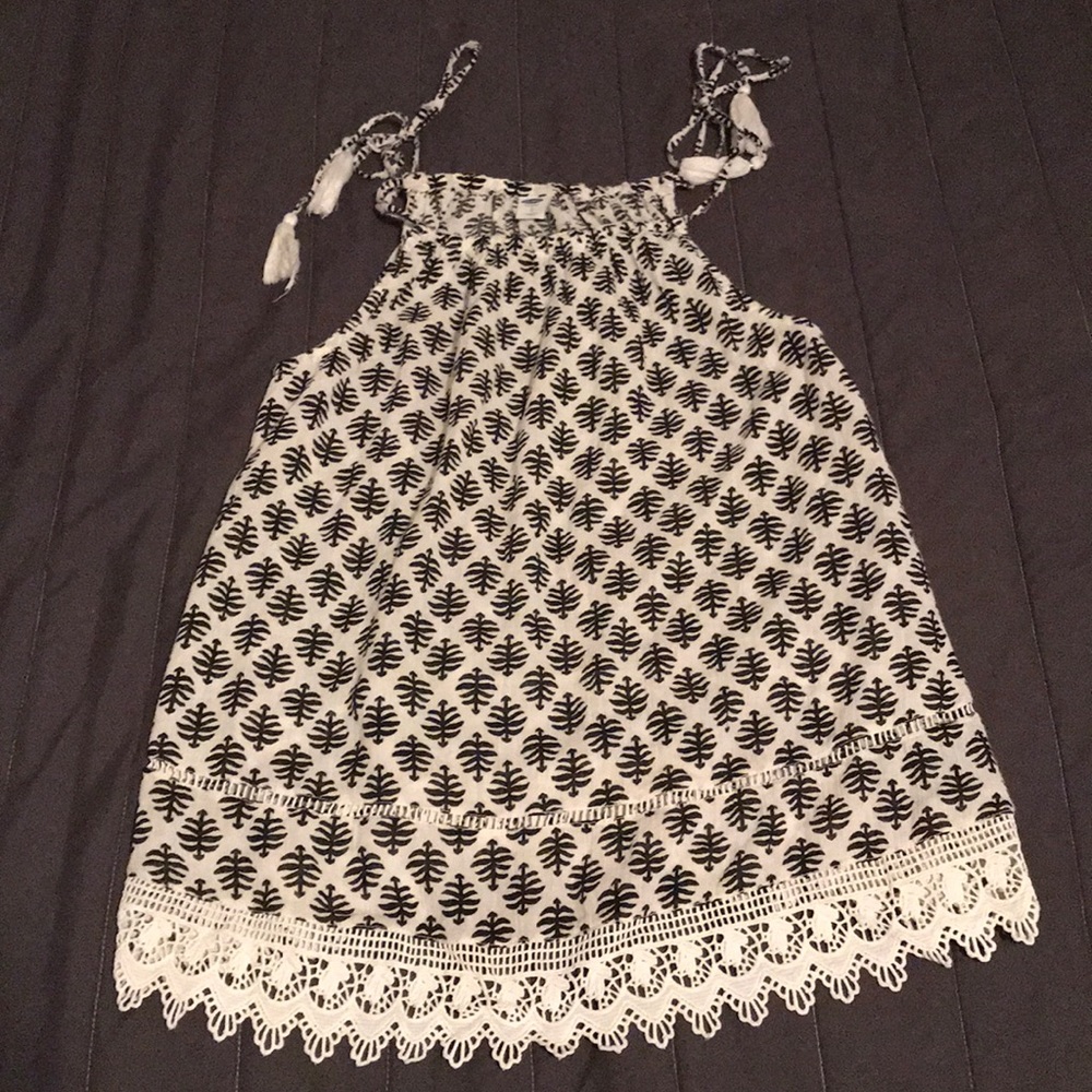 Black and White top with cute tassel detail